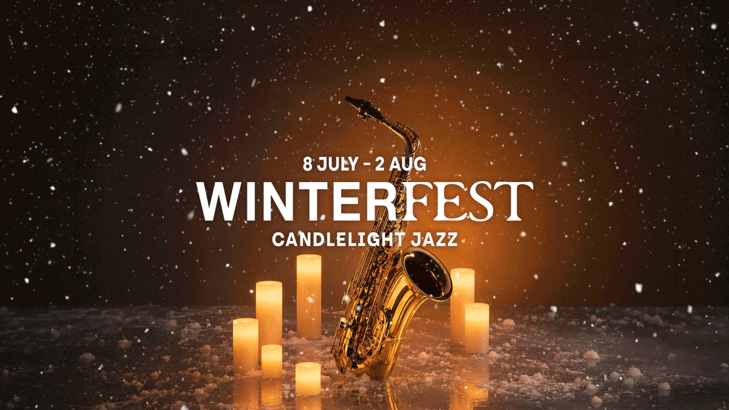 Live jazz band performance illuminated by candle light