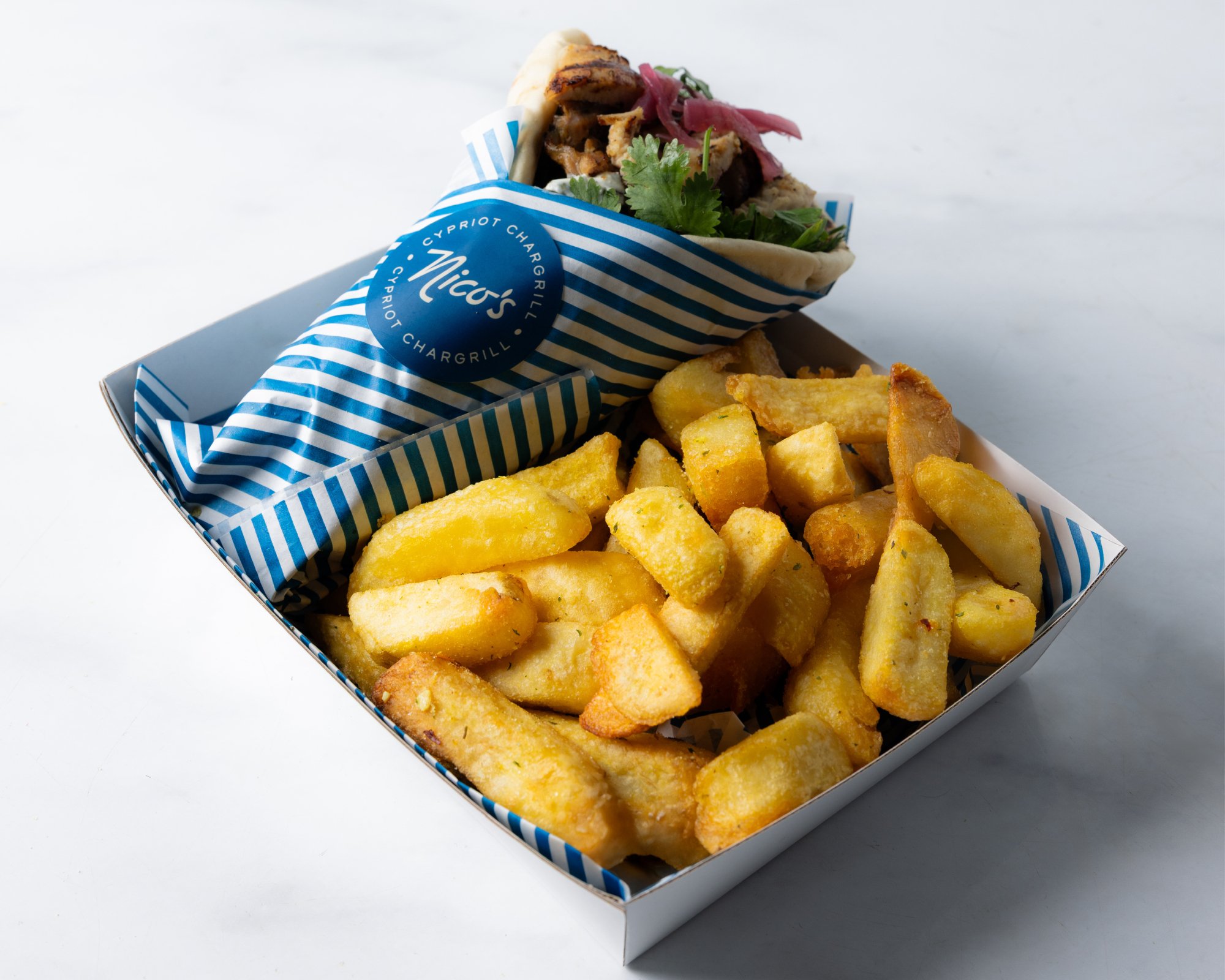 Zesty pork neck souvlaki with oregano, paprika & garlic.